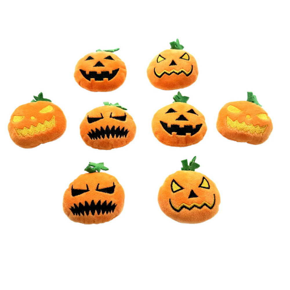 Plush jack-o’-lantern cat toys with embroidered faces