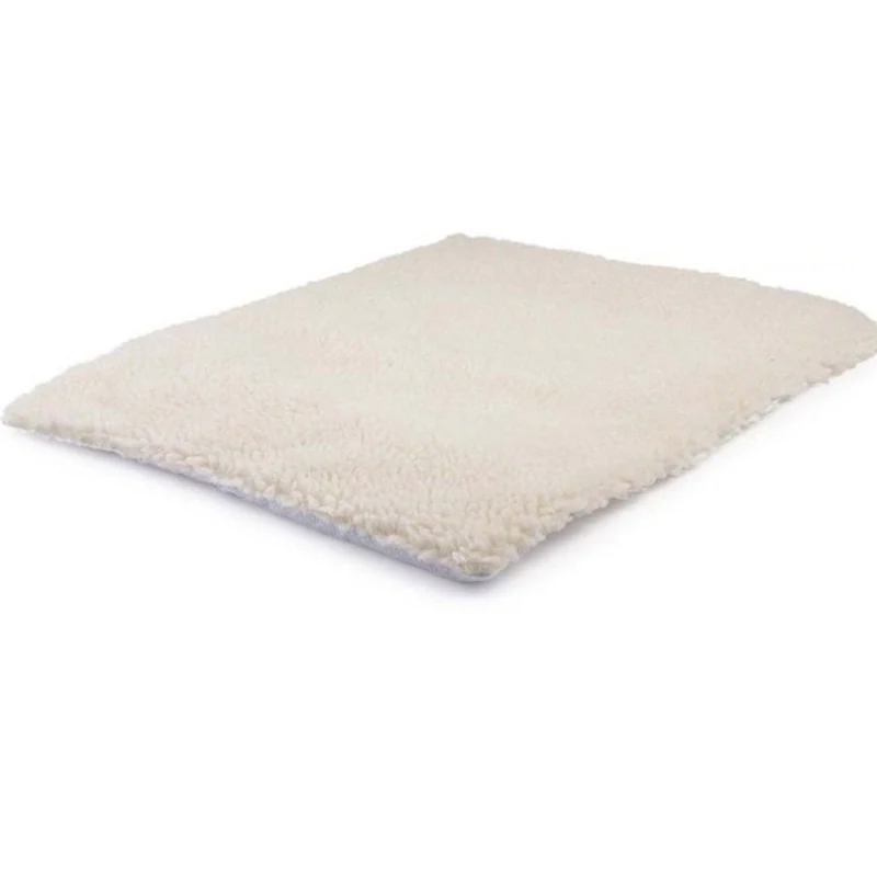The Warm Spot self-warming cat mat: a thin cream sherpa pad
